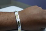Silver–Gold Leaf Pattern Chain Bracelet - Image 2