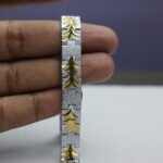 Silver–Gold Leaf Pattern Chain Bracelet